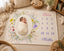 Wildflower milestone blanket with a newborn photographed in the centre oval