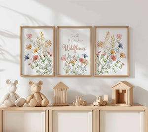 Wildflower quote set of 3 above a wooden shelf with toys